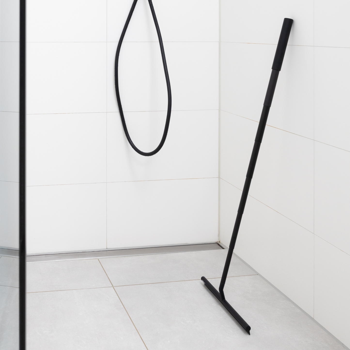 Raclette de douche extensible